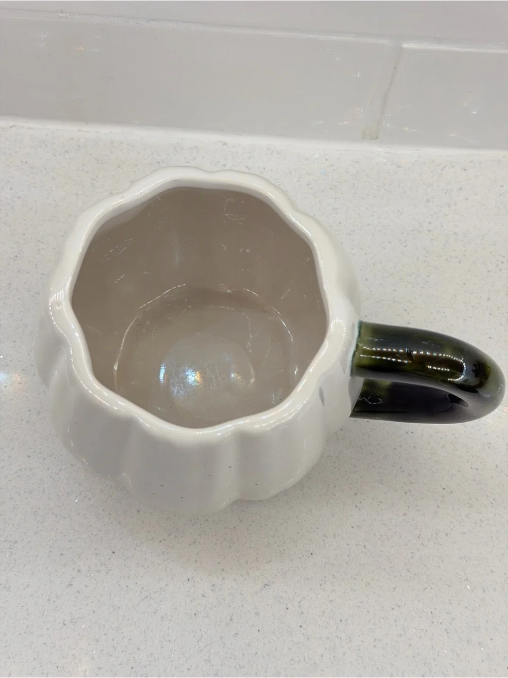 Cream Pumpkin-Shaped Ceramic Mug with Dark Green Handle